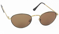 Ovala guldfärgade solglasögon med brunaktigt glas